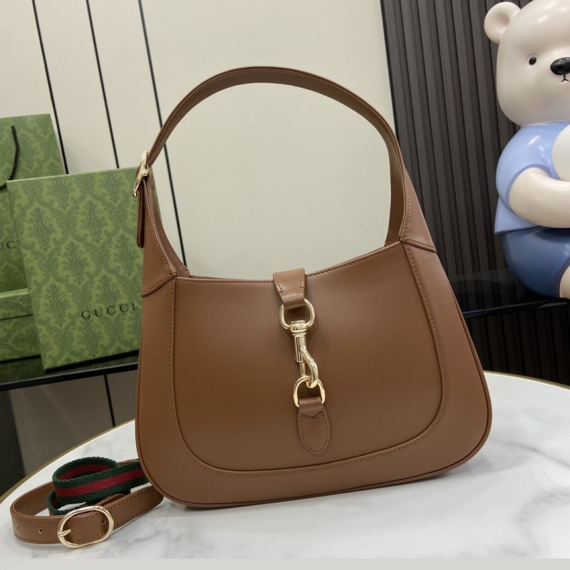 G*u*i top handle bags